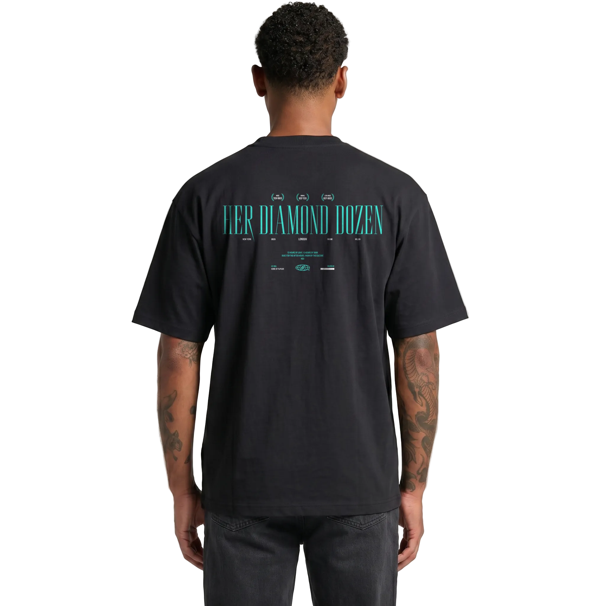 A man viewed from behind wearing a black t-shirt with a teal graphic print on the back that reads 'HER DIAMOND DOZEN'.