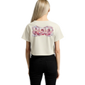 Person wearing a beige t-shirt with a colorful graphic on the back against a white background