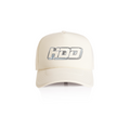 Cream cap with a chrome logo on a white background